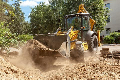Экскаватор-погрузчик New Holland B100B